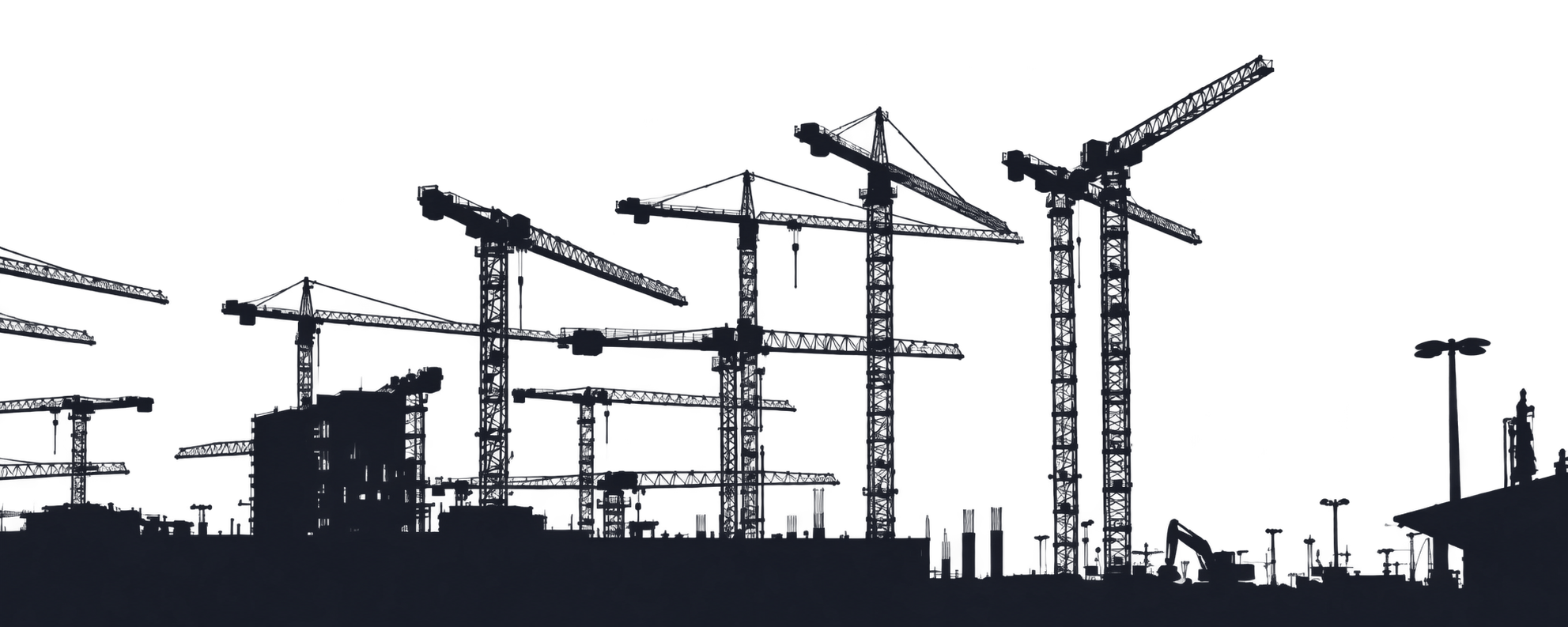 Silhouette of tower cranes and a construction site